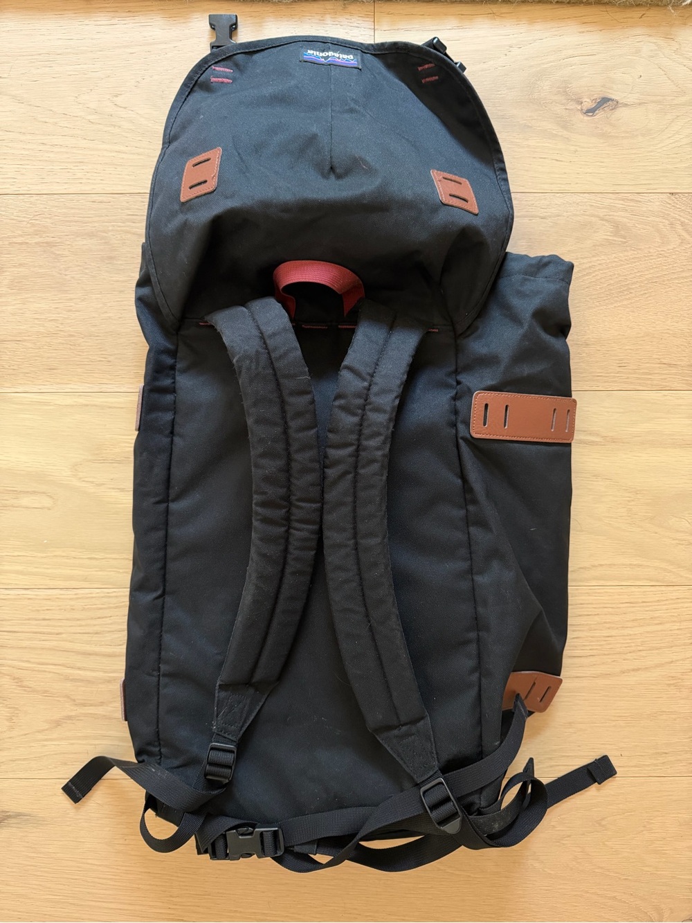 Patagonia Black Roll-Top Rucksack with Brown Trim - Picture 2 of 3